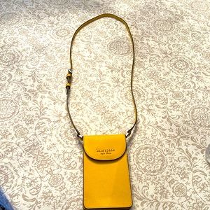 Kate Spade slim yellow/gold crossbody.
